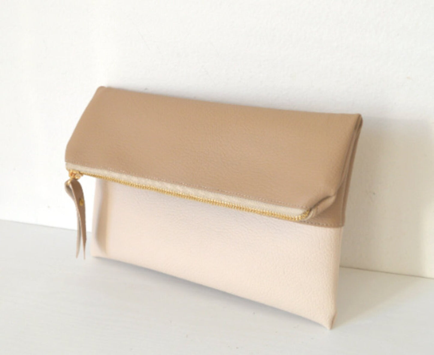 Two-tone foldover clutch