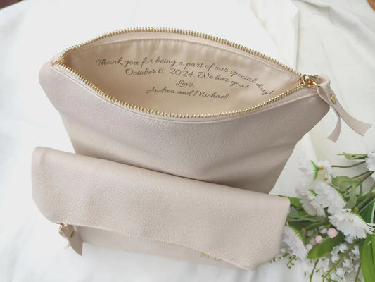 Fold over clutch in cream