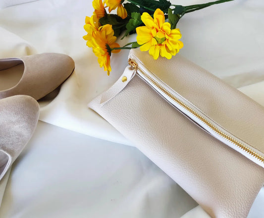 Fold over clutch in cream