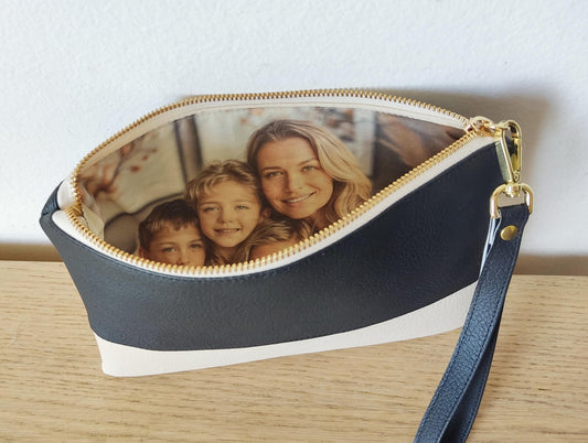 Two-tone clutch bag with a picture and message inside